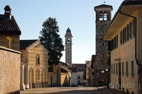 Quadrilocale con balconi e posto auto