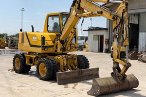 KOMATSU PW 95