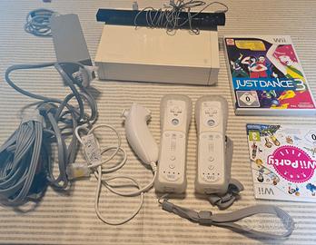 nintendo wii con Joysticks + 2 giochi