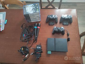 ps2 slim + kit sing star+ giochi