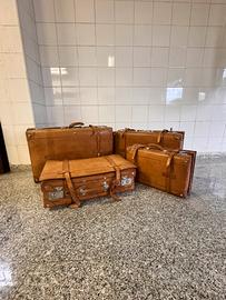 Set di quattro valigie vintage di cuoio e pelle