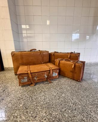 Set di quattro valigie vintage di cuoio e pelle