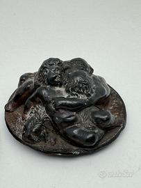 Coppia bronzetti ‘800 con putti su leone