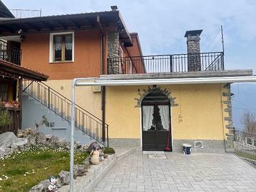 Casa singola con giardino e box doppio
