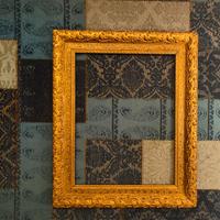 Antica cornice e specchiera in legno dorato