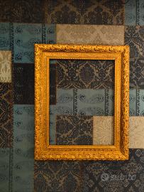 Antica cornice e specchiera in legno dorato