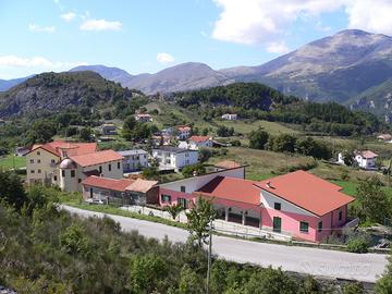 Villa bifamiliare con terreno