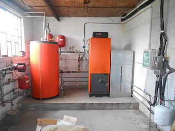 Impianto riscaldamento mais/biom. da 55kw +solare