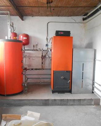 Impianto riscaldamento mais/biom. da 55kw +solare