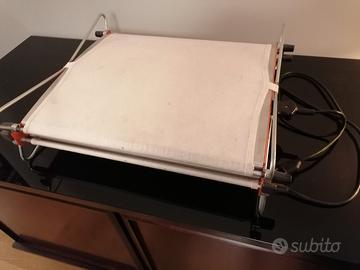 camera oscura: smaltatrice per carta baritata