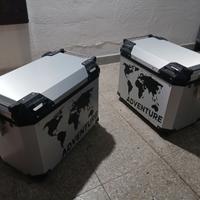 Tris completo di valigie.