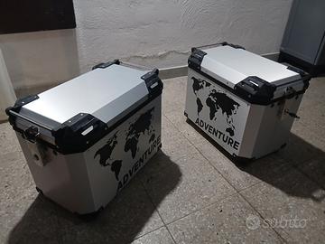 Tris completo di valigie.