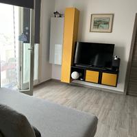 Soggiorno parete Tv con divano