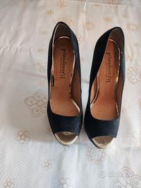 Décolleté nere con plateau e tacco a spillo