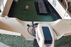 barca con motore 125 CC