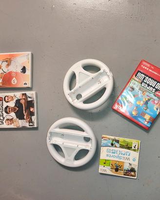 Giochi Wii  (4) + 2 volanti che si illuminano 