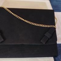 Pochette di grosgrain e scarpe anni 70
