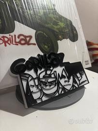 Logo Gorillaz 3D con personaggi