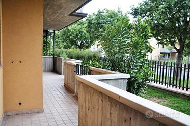 Appartamento al piano terra con giardino e garage