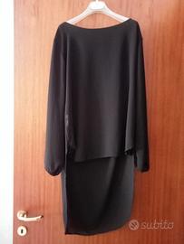 maglia nera asimmetrica.