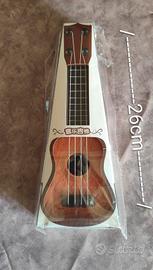 mini ukulele giocattolo per bambini da 26 cm