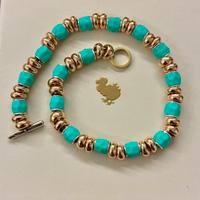 Dodo pomellato 1 granello azzurro turchese raro