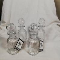 set di 4 boccette in vetro