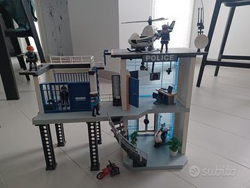 stazione polizia 
con auto moto ed elicottero
