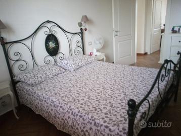 letto compreso di rete con doghe e materasso