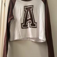 Maglia bianca e marrone con A taglia L
