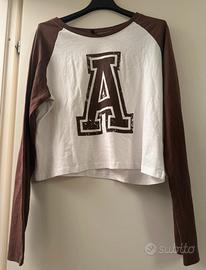 Maglia bianca e marrone con A taglia L