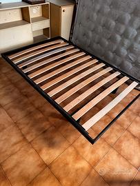 letto a doghe in legno da una piazza e mezzo