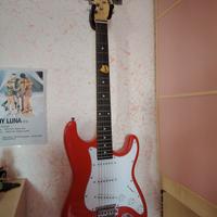 Chitarra elettrica con amplificatore e accessori