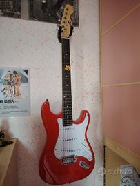 Chitarra elettrica con amplificatore e accessori