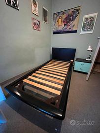 letto  con rete in doghe