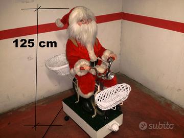 Pupazzo babbo natale in bicicletta vintage