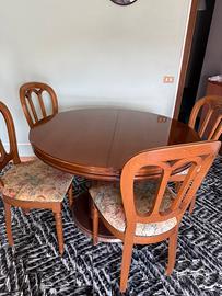 Tavolo tondo allungabile con 6 sedie imbottite