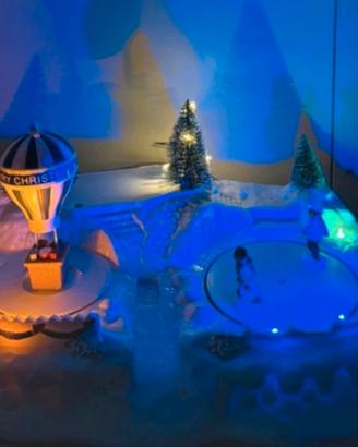 Villaggio natalizio luminoso e musicale