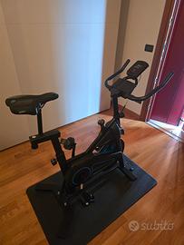 spinbike QK-116C con disco da 12kg 