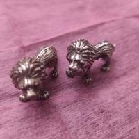 Coppia di leoni in argento
