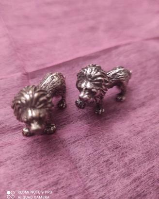 Coppia di leoni in argento