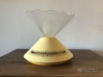 Bilancia Guzzini gialla Design Ennio Pasini