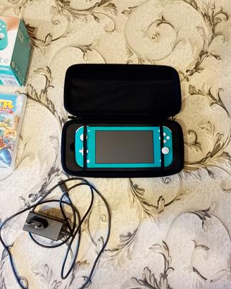 switch lite con giochi e accessori