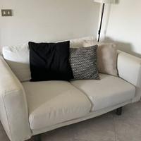 Divano specchio tavolino arredo soggiorno design