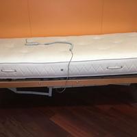 letto a doghe con regolazione elettrica