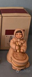 Donna con polenta presepe Thun champagne