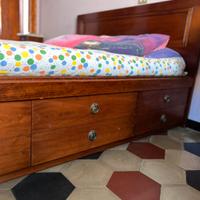 Letto matrimoniale 14 cassetti massello