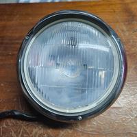 faro e frecce vintage per moto