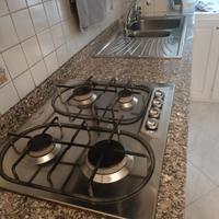 piano marmo con lavello e piano cottura 