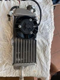 Radiatore destro con ventola Hm 125, interasse 165